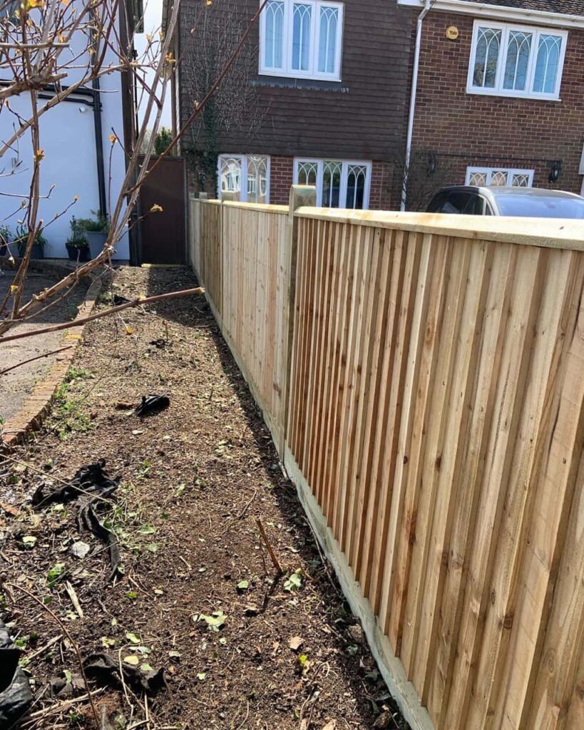 This is a photo of feather edge fencing installed in a residential property by Fast Fix Fencing Doddington
